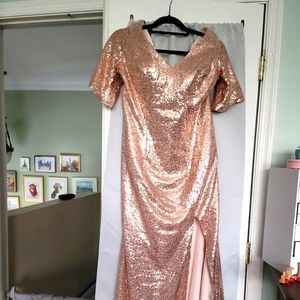 Size 14 rose gold dress with a slit on left leg.